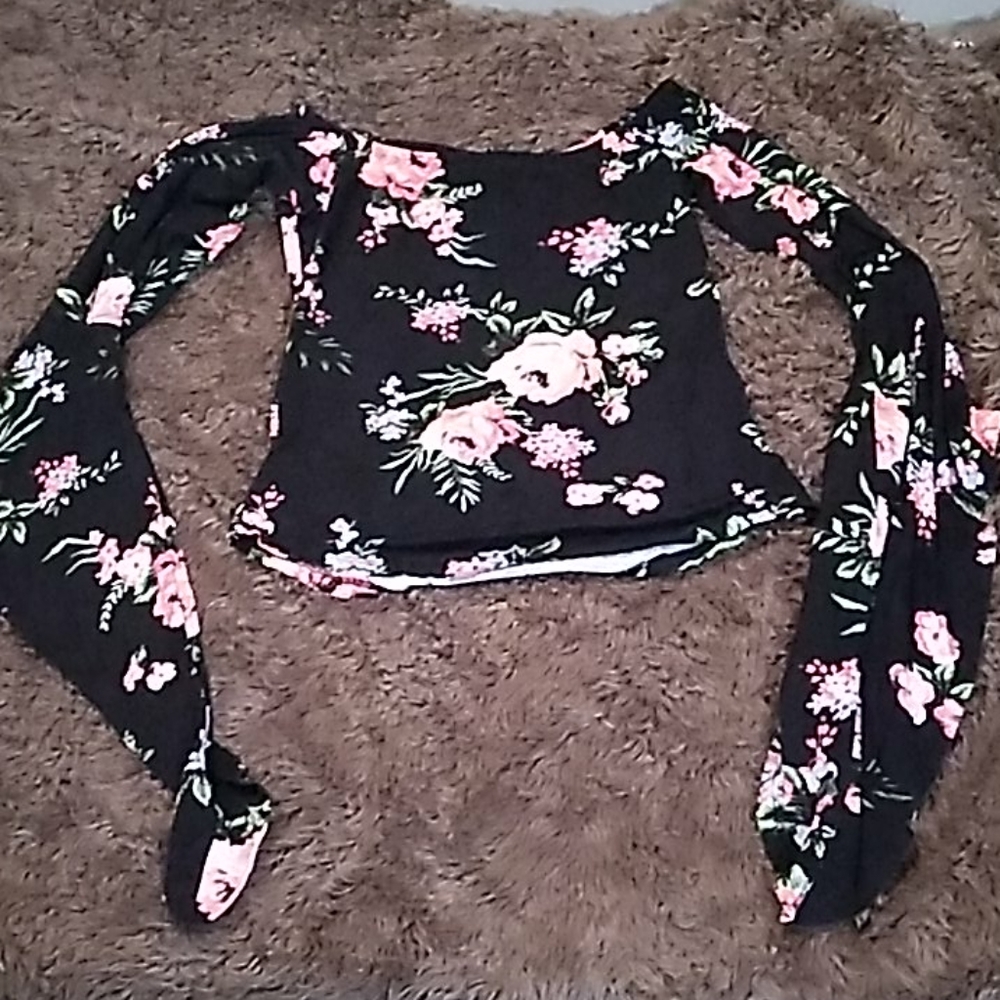 Off-the-shoulder black floral shirt